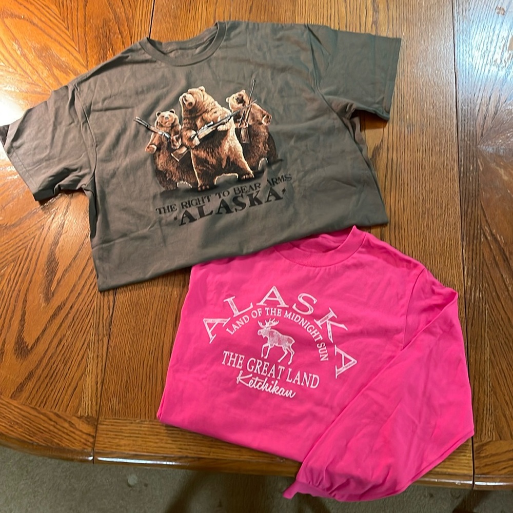 2 Alaska t-shirts. Olive green short sleeve. Fuchsia long sleeve. Adult medium.